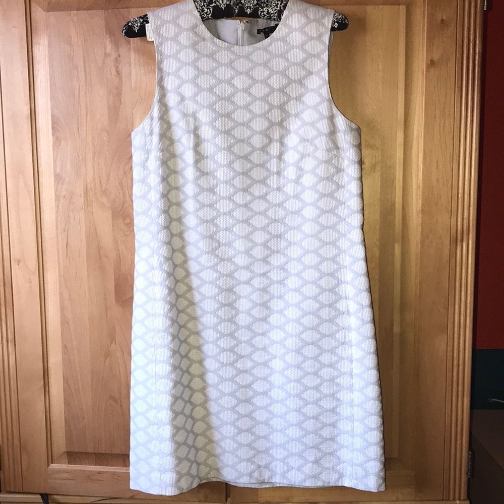 This is a very flattering dress and the textured design is gorgeous and unique.